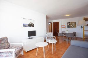 Telewizja i/lub zestaw kina domowego w obiekcie Apartamentos Don Quijote