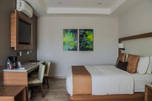 Letto o letti in una camera di Hotel Soleil Business Class
