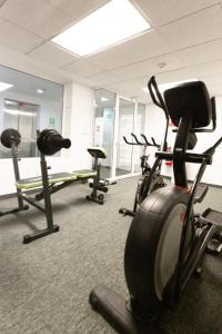 a gym with several exercise bikes in a room at HS HOTSSON Smart Value Tampico in Tampico