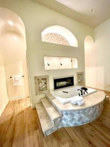 a large bathroom with a large tub in a room at The Zenda Estate in Indio
