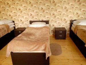 Katil atau katil-katil dalam bilik di Red Stone Guest House