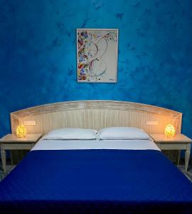 Postel nebo postele na pokoji v ubytování Villa Liberti