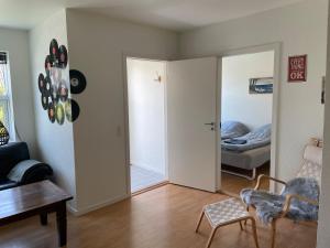 Postel nebo postele na pokoji v ubytování Havne huset