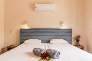 Łóżko lub łóżka w pokoju w obiekcie ABC Lodges Curacao
