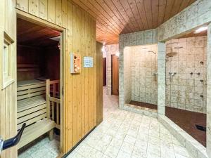 a bathroom with a walk in shower and a walk in shower at Haus Sabine in Leutasch
