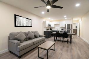 a living room with a couch and a ceiling fan at Legacy Vacation Resorts Steamboat Springs Suites in Steamboat Springs