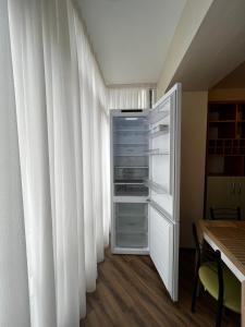 Kuchyň nebo kuchyňský kout v ubytování Eco Apartments Melnyka10