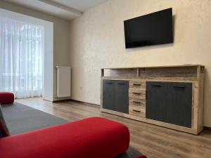 TV a/nebo společenská místnost v ubytování Eco Apartments Melnyka10