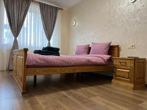 Postel nebo postele na pokoji v ubytování Eco Apartments Melnyka10