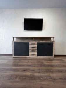 TV a/nebo společenská místnost v ubytování Eco Apartments Melnyka10