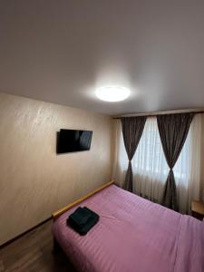Postel nebo postele na pokoji v ubytování Eco Apartments Melnyka10