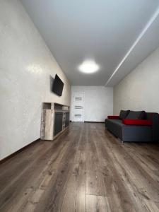 TV a/nebo společenská místnost v ubytování Eco Apartments Melnyka10