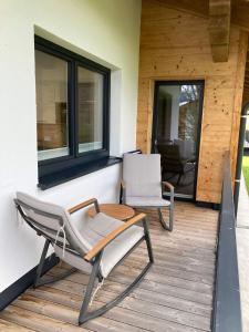 Ein Sitzbereich in der Unterkunft Appartements Blumenwiese