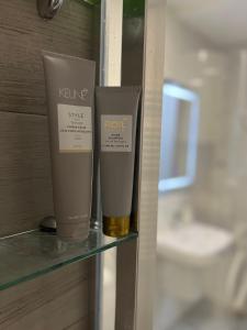 two bottles of krinerinerinerinerinerinerinerineernessernessernesserness at Maria's Elite Luxury Apartment Skopje in Skopje +27 photos