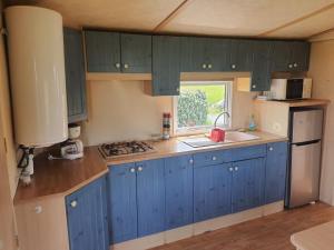 Kuchyň nebo kuchyňský kout v ubytování Camping Village Nature D'O
