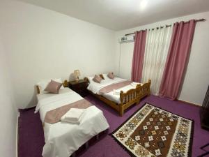 Katil atau katil-katil dalam bilik di taila hostel