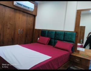 Lova arba lovos apgyvendinimo įstaigoje Sangam Resort & Hotel