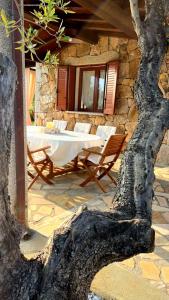 Φωτογραφία από το άλμπουμ του Casa Conchiglia - mit Dachterrasse und Panoramablick auf Berge und Meer σε Tanaunella