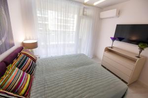 Katil atau katil-katil dalam bilik di Businka