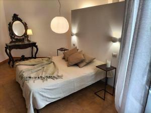 Postel nebo postele na pokoji v ubytování case vacanza Il Castello