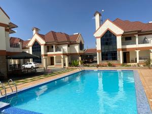 Bazén v ubytování Lifestyle Villas, Nanyuki nebo v jeho okolí