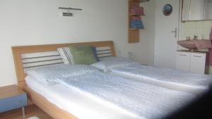 Posteľ alebo postele v izbe v ubytovaní Appartement am Strand