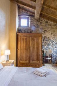 Postel nebo postele na pokoji v ubytování Casa Dafne