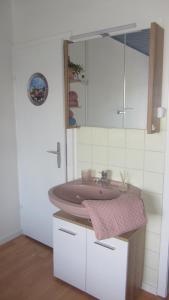 Kúpeľňa v ubytovaní Appartement am Strand