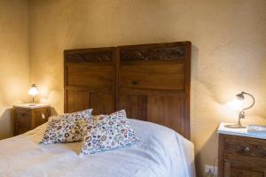 Postel nebo postele na pokoji v ubytování Casa Dafne