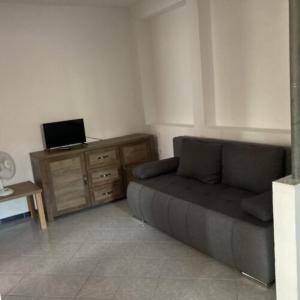 TV a/nebo společenská místnost v ubytování Pizza Sztori Apartman