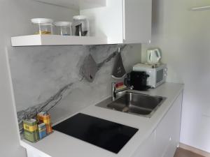 Kuchyňa alebo kuchynka v ubytovaní Sweet Home Canavese