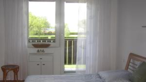 Posteľ alebo postele v izbe v ubytovaní Appartement am Strand