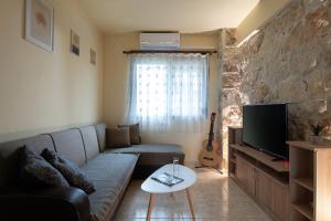 Μια τηλεόραση ή/και κέντρο ψυχαγωγίας στο Casa De Piedra +11 φωτογραφίες