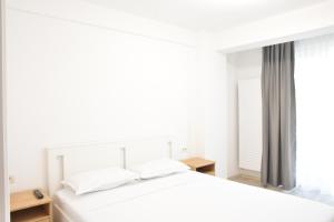 Katil atau katil-katil dalam bilik di RoApart Mamaia - B2 Home