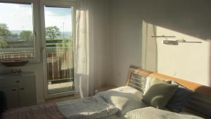Posteľ alebo postele v izbe v ubytovaní Appartement am Strand