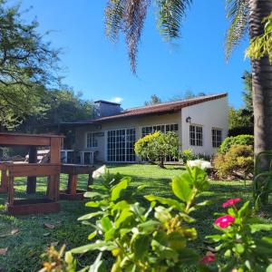 a view of the house from the yard at Las Glicinas in Federación