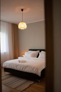 Ένα ή περισσότερα κρεβάτια σε δωμάτιο στο Apartment Narona Mostar