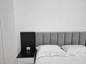 Postel nebo postele na pokoji v ubytování Vila Klari