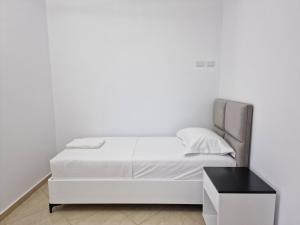 Postel nebo postele na pokoji v ubytování Vila Klari