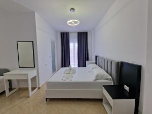 Postel nebo postele na pokoji v ubytování Vila Klari