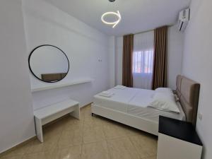 Postel nebo postele na pokoji v ubytování Vila Klari