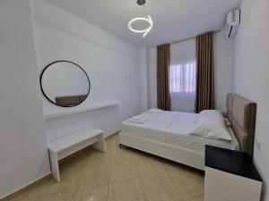 Postel nebo postele na pokoji v ubytování Vila Klari