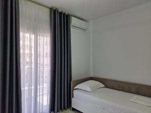 Postel nebo postele na pokoji v ubytování Vila Klari