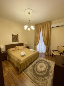 Postel nebo postele na pokoji v ubytování Varapodio B&B