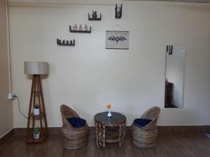 Posezení v ubytování Mulaqat Homestay