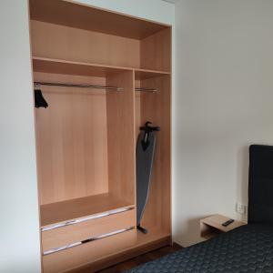 a built in wardrobe in a bedroom at Esplanad Suites in Mariehamn