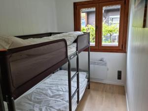 Postel nebo postele na pokoji v ubytování Le Cha'let Resteigne