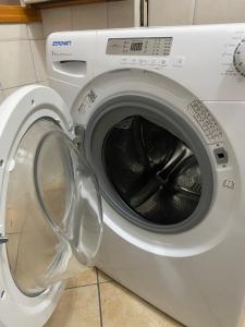 a white washing machine sitting next to a washer at Bilocale degli Innamorati in Terni