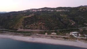 an aerial view of a mountain with a road on it at La Formica in Ascea +38 photos