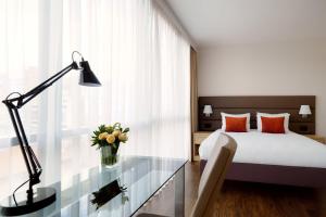 Postel nebo postele na pokoji v ubytování Residence Inn by Marriott Sarajevo + 11 fotografií